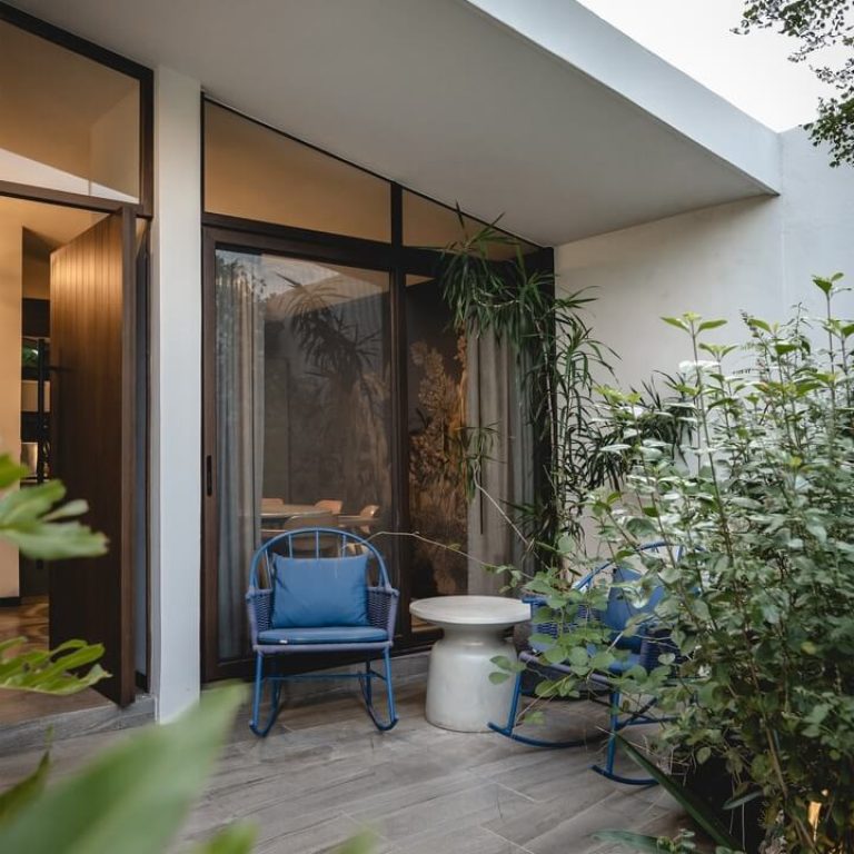 Fachada interior, Casa Ahimsa por Binomio Taller