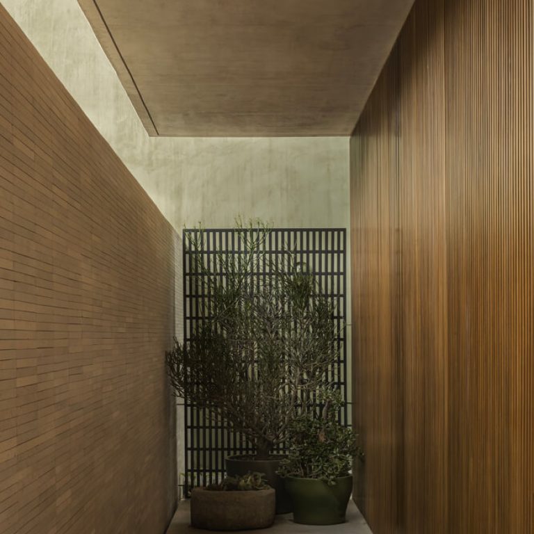 Casa DLCA por 0studio Arquitectura: Integración Paisajística y Diseño