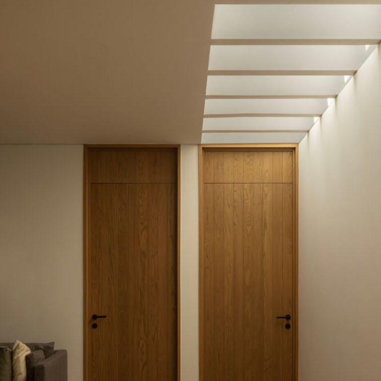 Casa DLCA por 0studio Arquitectura: Integración Paisajística y Diseño