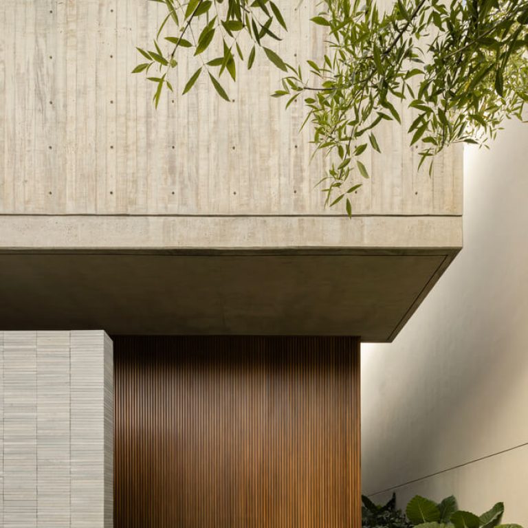 Casa DLCA por 0studio Arquitectura: Integración Paisajística y Diseño