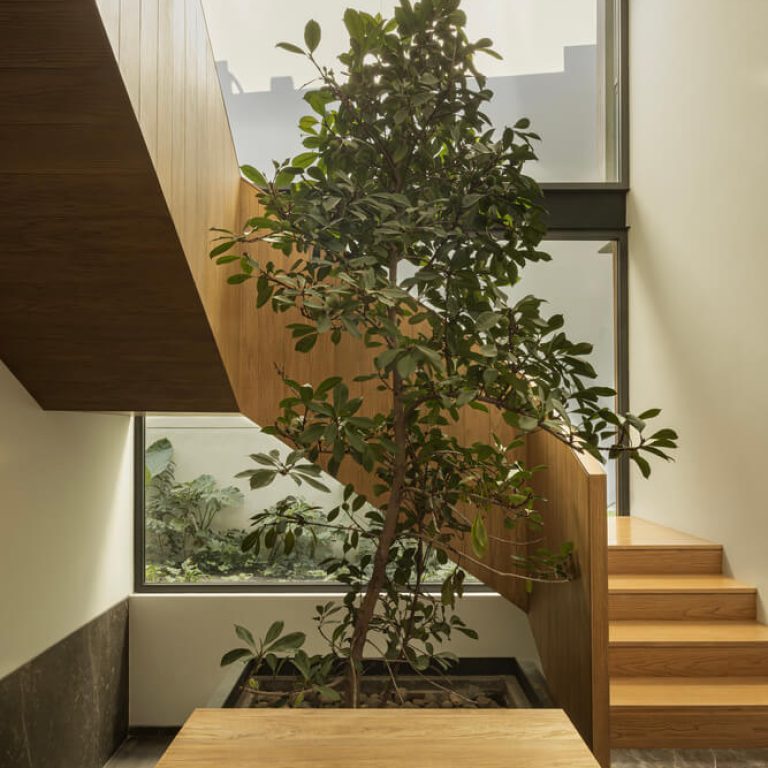 Casa DLCA por 0studio Arquitectura: Integración Paisajística y Diseño