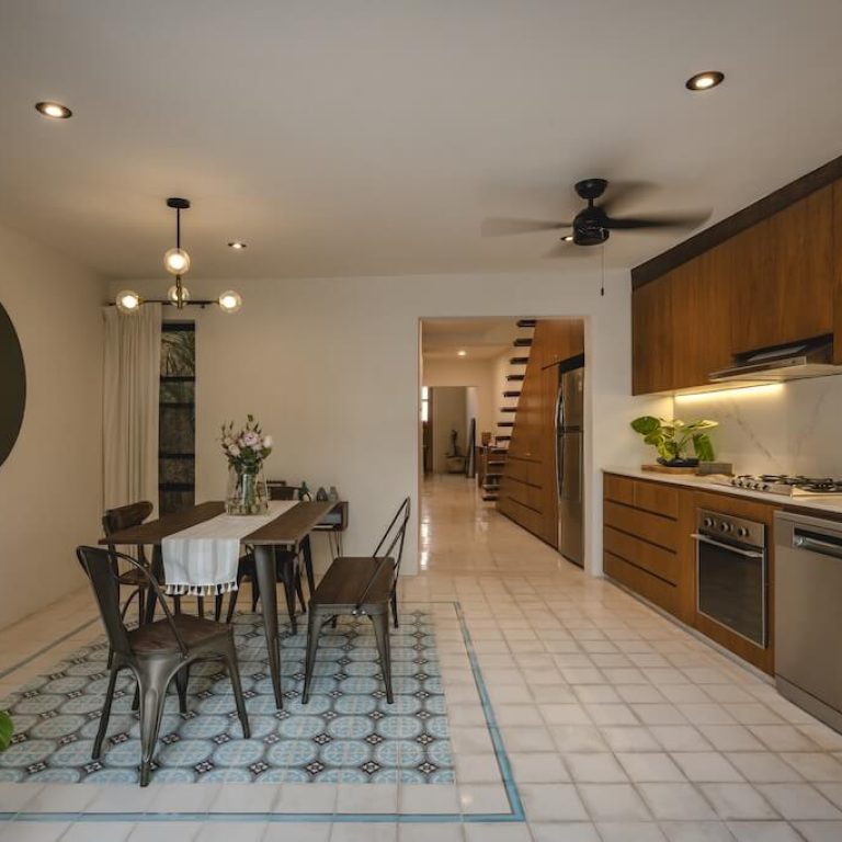 Espacios interiores conectados de Casa Doble R
