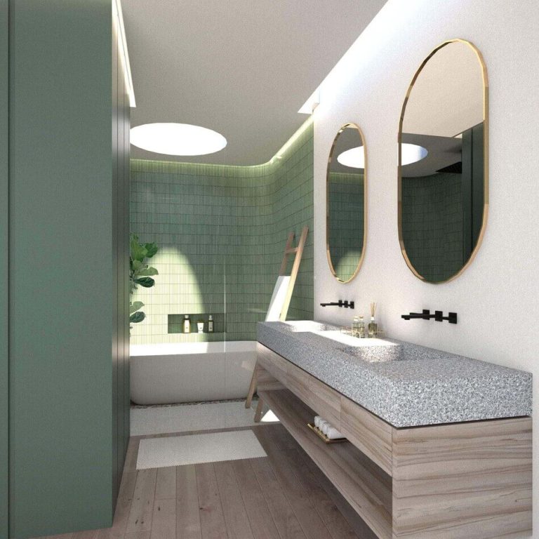 A modern bathroom with green walls and wooden floors.