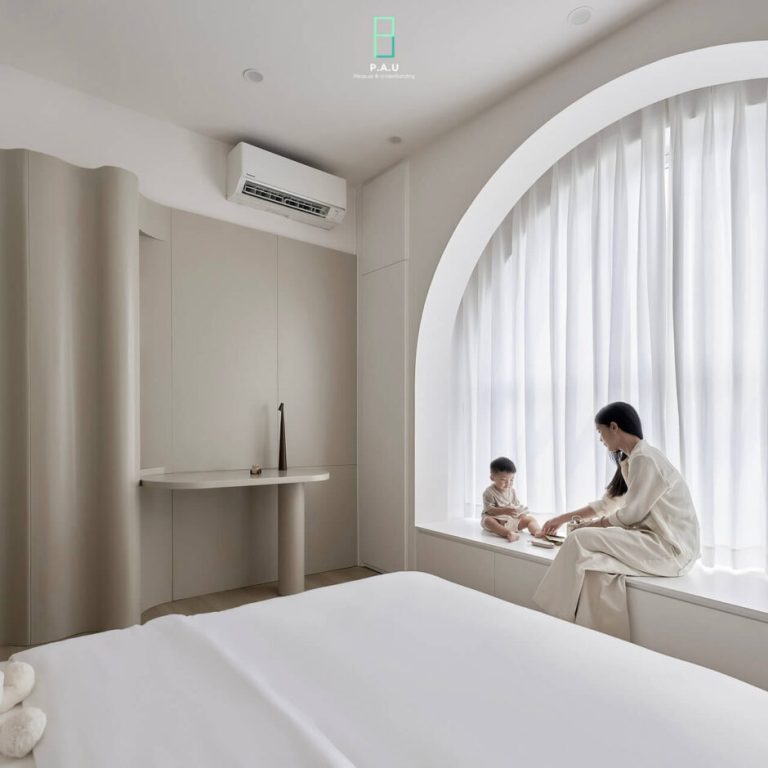 Casa Oasis: Vivienda Unifamiliar con Cocina Central y Techo Abovedado Curvo en Vietnam
