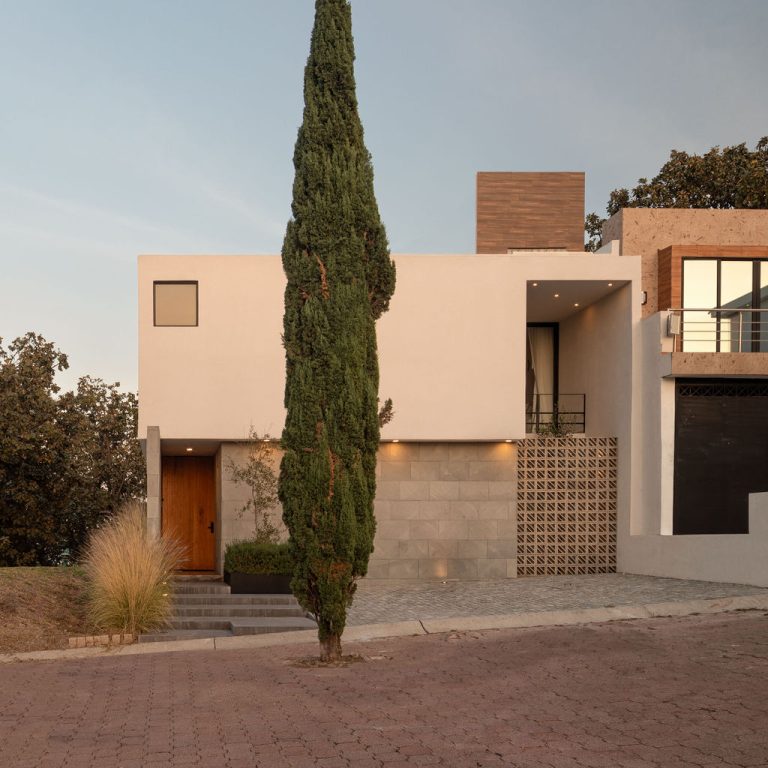 Casa entre arboles por IMA taller de arquitectura